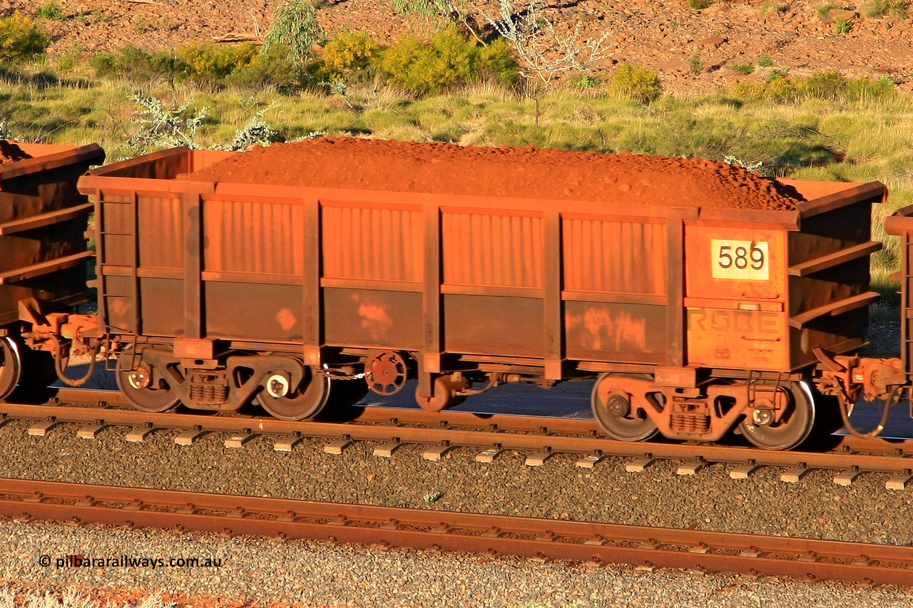 0589 110602 1705
Robe River ore waggon 589, built by Tomlinson Steel WA, rotary coupler end handbrake side loaded view at the 71 km, Western Creek on the Deepdale line. June 2, 2011.
Keywords: 589;Tomlinson-Steel-WA;Robe-ore-waggon;