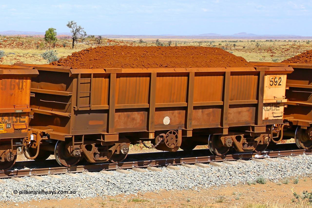 0592 170729 0238
Robe River ore waggon 592, built by Tomlinson Steel WA, fixed coupler handbrake side loaded view at the 103 km, between Maitland Siding and the Fortescue River on the Deepdale line. July 29, 2017.
Keywords: 592;Tomlinson-Steel-WA;Robe-ore-waggon;