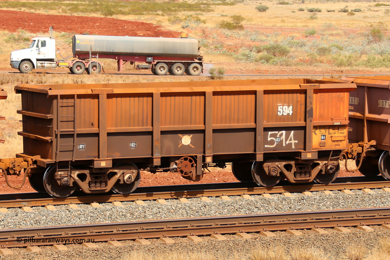 0594 141124 6821
Robe River ore waggon 594, built by Tomlinson Steel WA, fixed coupler handbrake side empty view at the 25 km at Arches Siding on the Cape Lambert line. November 24, 2014.
Keywords: 594;Tomlinson-Steel-WA;Robe-ore-waggon;