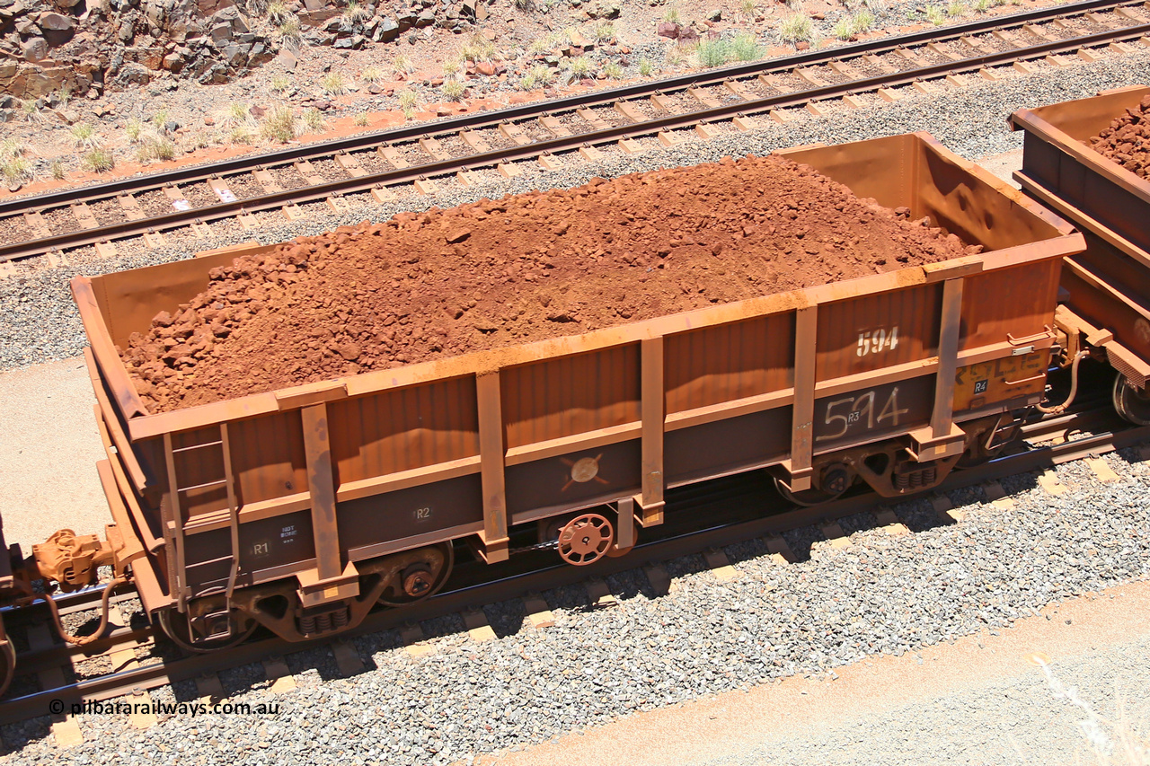 0594 160306 1481
Robe River ore waggon 594, built by Tomlinson Steel WA, fixed coupler handbrake side loaded view, at the 45 km, Harding Siding on the Cape Lambert line. March 6, 2016.
Keywords: 594;Tomlinson-Steel-WA;Robe-ore-waggon;