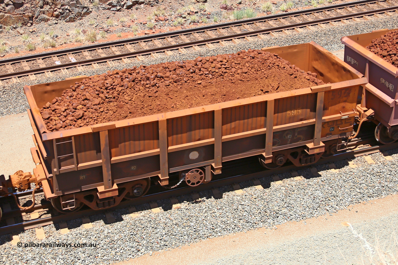 0595 160306 1495
Robe River ore waggon 595, built by Tomlinson Steel WA, fixed coupler handbrake side loaded view, at the 45 km, Harding Siding on the Cape Lambert line. March 6, 2016.
Keywords: 595;Tomlinson-Steel-WA;Robe-ore-waggon;