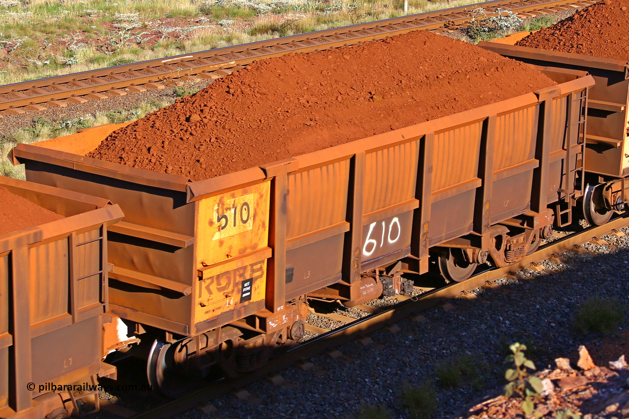 0610 210322 9693
Robe River ore waggon 610, built by Tomlinson Steel WA, rotary coupler end non-handbrake side loaded view at the 17 km on the Cape Lambert line, March 22, 2021.
Keywords: 610;Tomlinson-Steel-WA;Robe-ore-waggon;