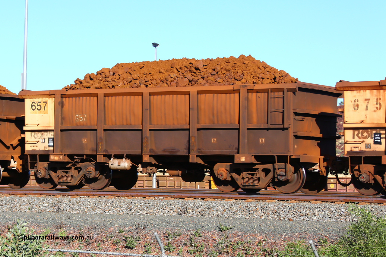 0657 210322 9385
Robe River ore waggon 657, built by Tomlinson Steel WA, fixed coupler non-handbrake side loaded view at Cape Lambert yard, March 22, 2021.
Keywords: 657;Tomlinson-Steel-WA;Robe-ore-waggon;