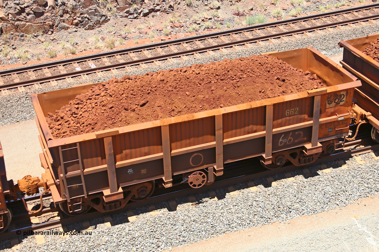 0662 160306 1483
Robe River ore waggon 662, built by Tomlinson Steel WA, fixed coupler handbrake side loaded view, at the 45 km, Harding Siding on the Cape Lambert line. March 6, 2016.
Keywords: 662;Tomlinson-Steel-WA;Robe-ore-waggon;