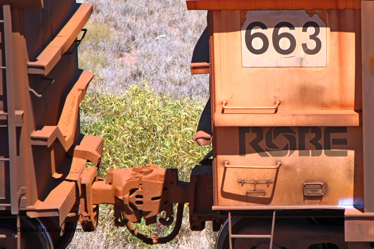 0663 081209 0124
Robe River ore waggon 663, built by Tomlinson Steel WA, rotary coupler end, panel and plate view, also shows drop rib detail on adjoining waggon, at the 7 km location just south of Cape Lambert yard. December 9, 2008.
Keywords: 663;Tomlinson-Steel-WA;Robe-ore-waggon;