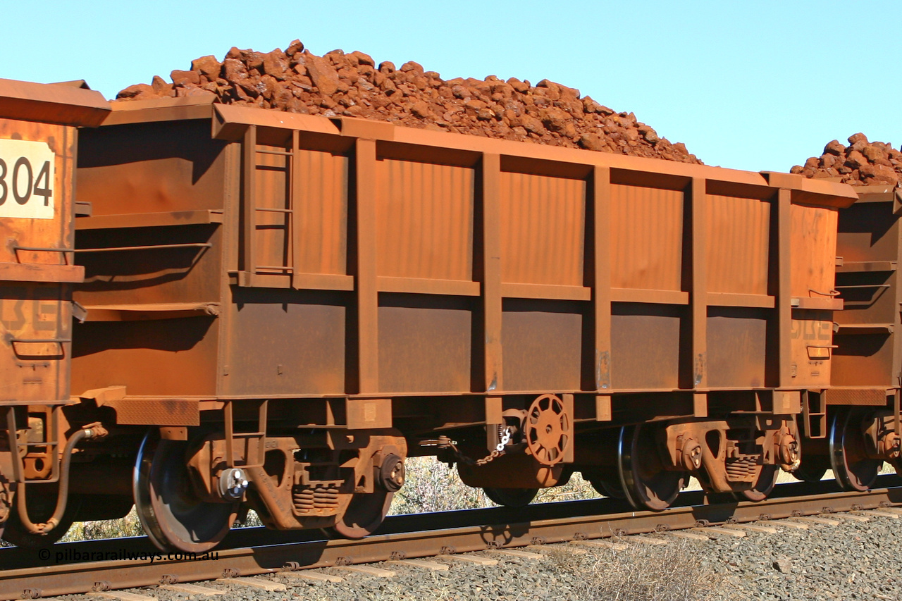 0664 060716 7192
Robe River ore waggon 664, built by Tomlinson Steel WA, fixed coupler end handbrake side loaded. Western Creek, July 16, 2006.
Keywords: 664;Tomlinson-Steel-WA;Robe-ore-waggon;