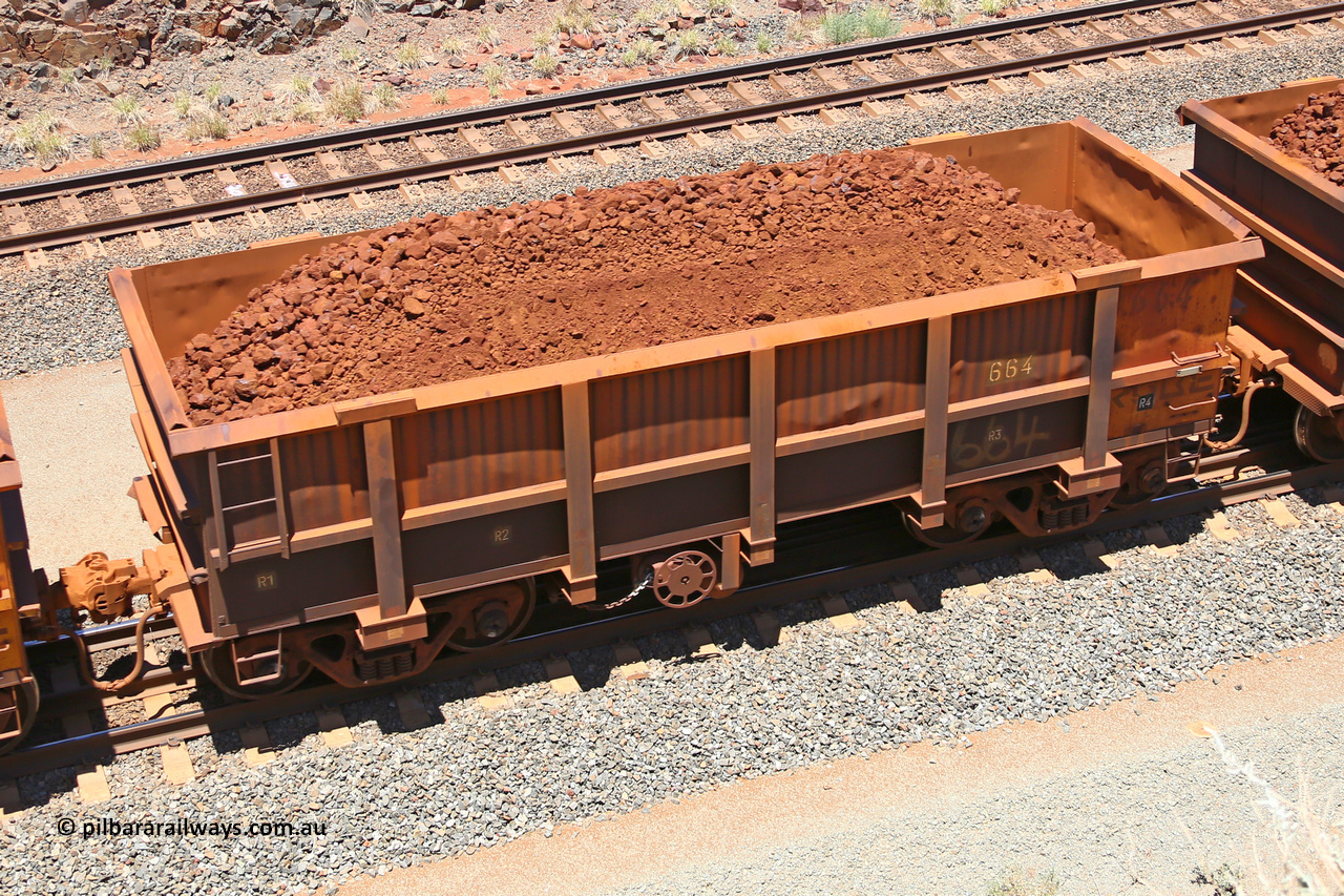 0664 160306 1494
Robe River ore waggon 664, built by Tomlinson Steel WA, fixed coupler handbrake side loaded view, at the 45 km, Harding Siding on the Cape Lambert line. March 6, 2016.
Keywords: 664;Tomlinson-Steel-WA;Robe-ore-waggon;