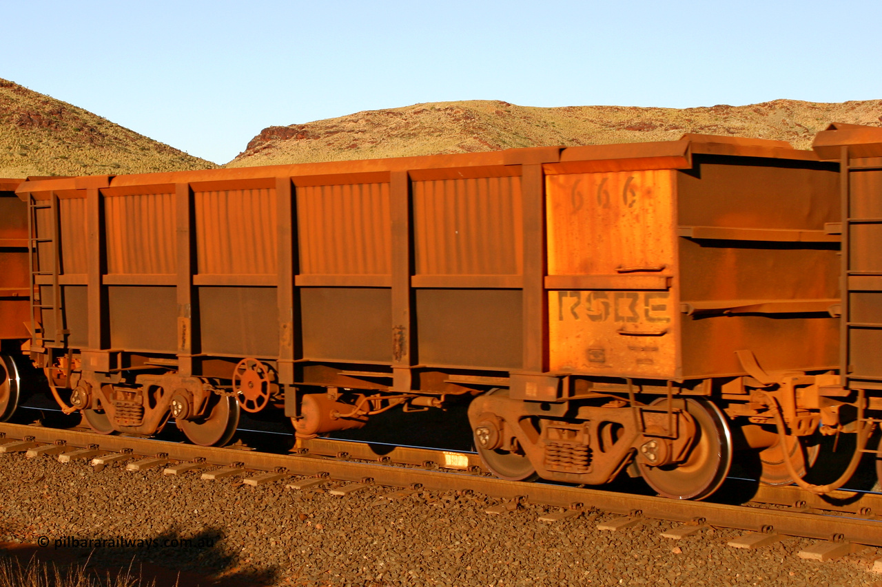 0666 060722 7624
Robe River ore waggon 666, built by Tomlinson Steel WA, rotary coupler end handbrake side empty view, at the 11.7 km, Cape Lambert. July 22, 2006.
Keywords: 666;Tomlinson-Steel-WA;Robe-ore-waggon;