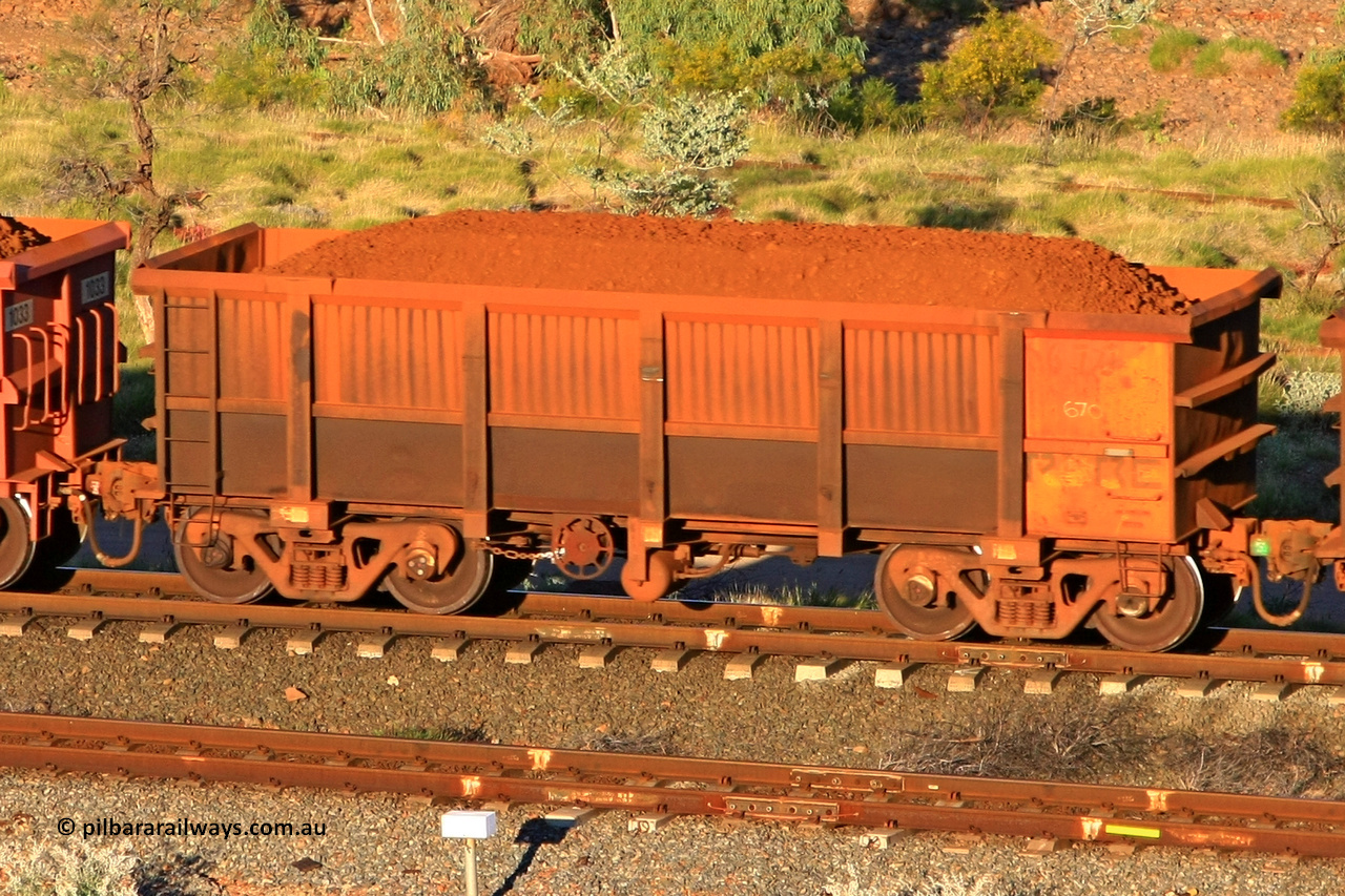0670 110602 1625
Robe River ore waggon 670, built by Tomlinson Steel WA, rotary coupler end handbrake side loaded view at the 71 km, Western Creek on the Deepdale line. June 2, 2011.
Keywords: 670;Tomlinson-Steel-WA;Robe-ore-waggon;