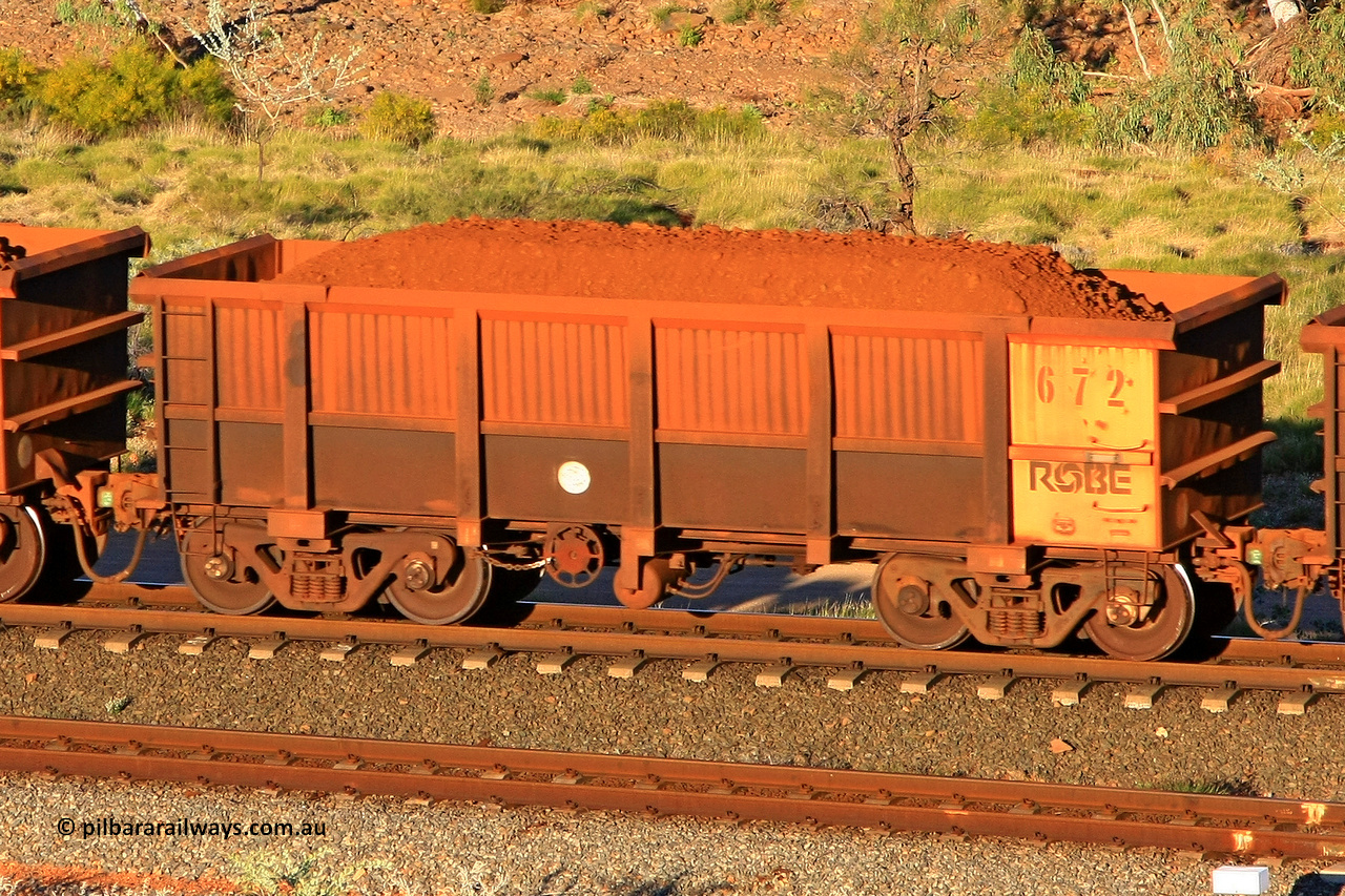 0672 110602 1683
Robe River ore waggon 672, built by Tomlinson Steel WA, rotary coupler end handbrake side loaded view at the 71 km, Western Creek on the Deepdale line. June 2, 2011.
Keywords: 672;Tomlinson-Steel-WA;Robe-ore-waggon;