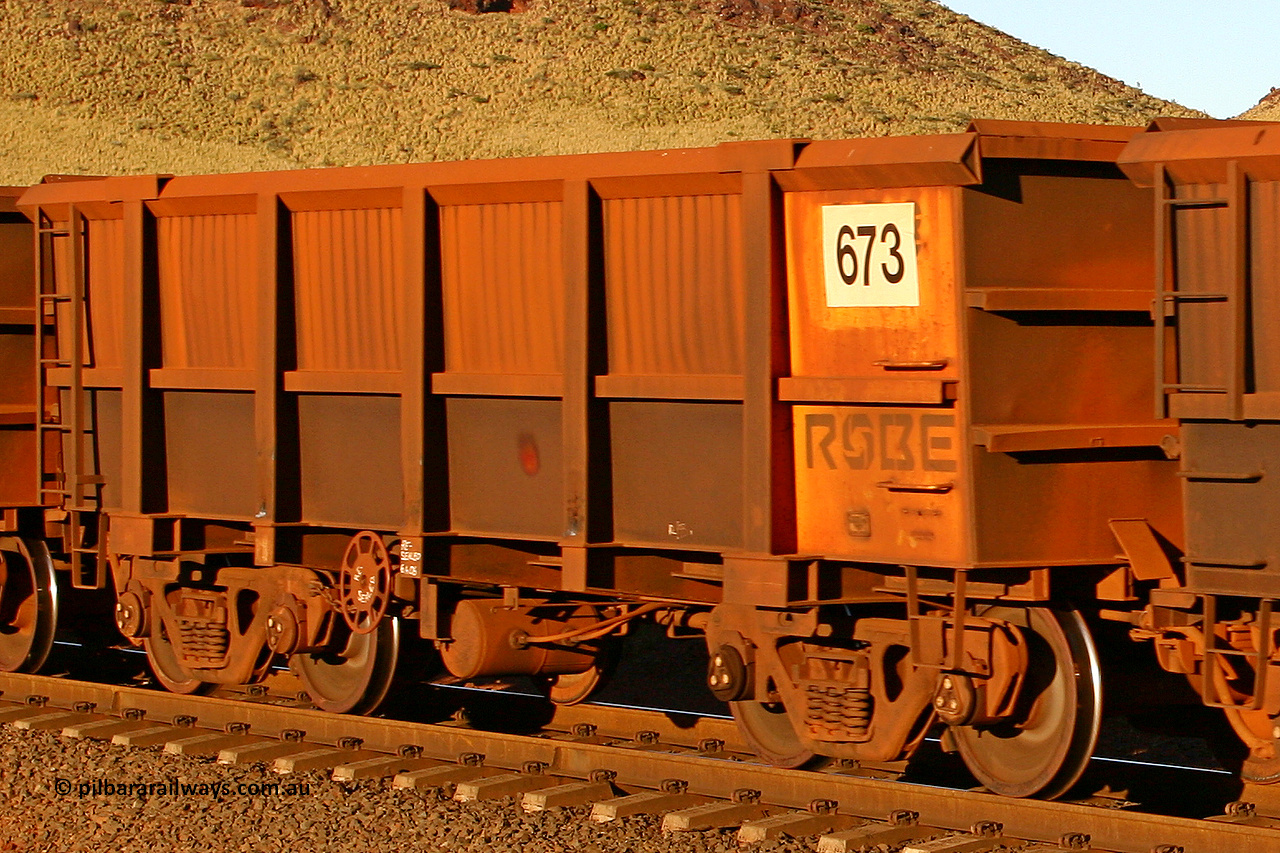 0673 060722 7621
Robe River ore waggon 673, built by Tomlinson Steel WA, rotary coupler end handbrake side empty view, at the 11.7 km, Cape Lambert. July 22, 2006.
Keywords: 673;Tomlinson-Steel-WA;Robe-ore-waggon;