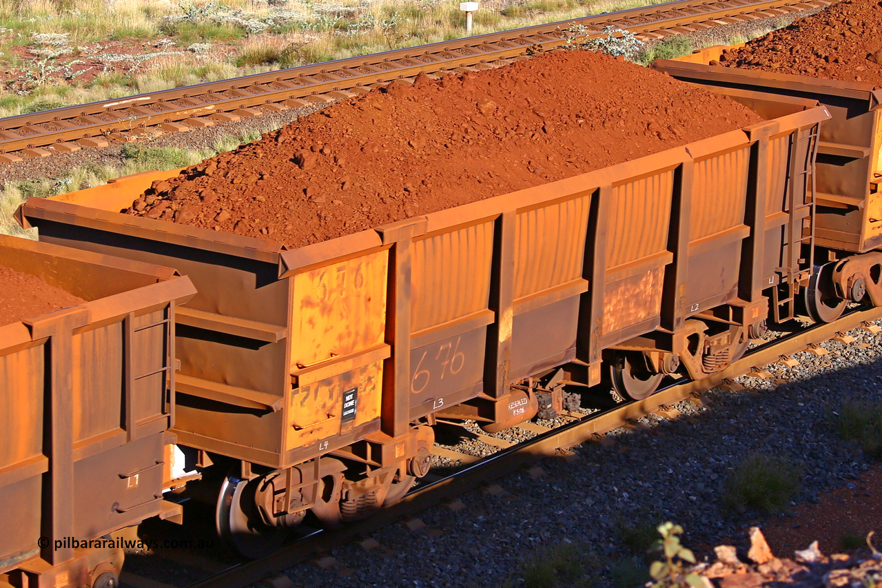 0676 210322 9778
Robe River ore waggon 676, built by Tomlinson Steel WA, rotary coupler end non-handbrake side loaded view at the 17 km on the Cape Lambert line, March 22, 2021.
Keywords: 676;Tomlinson-Steel-WA;Robe-ore-waggon;