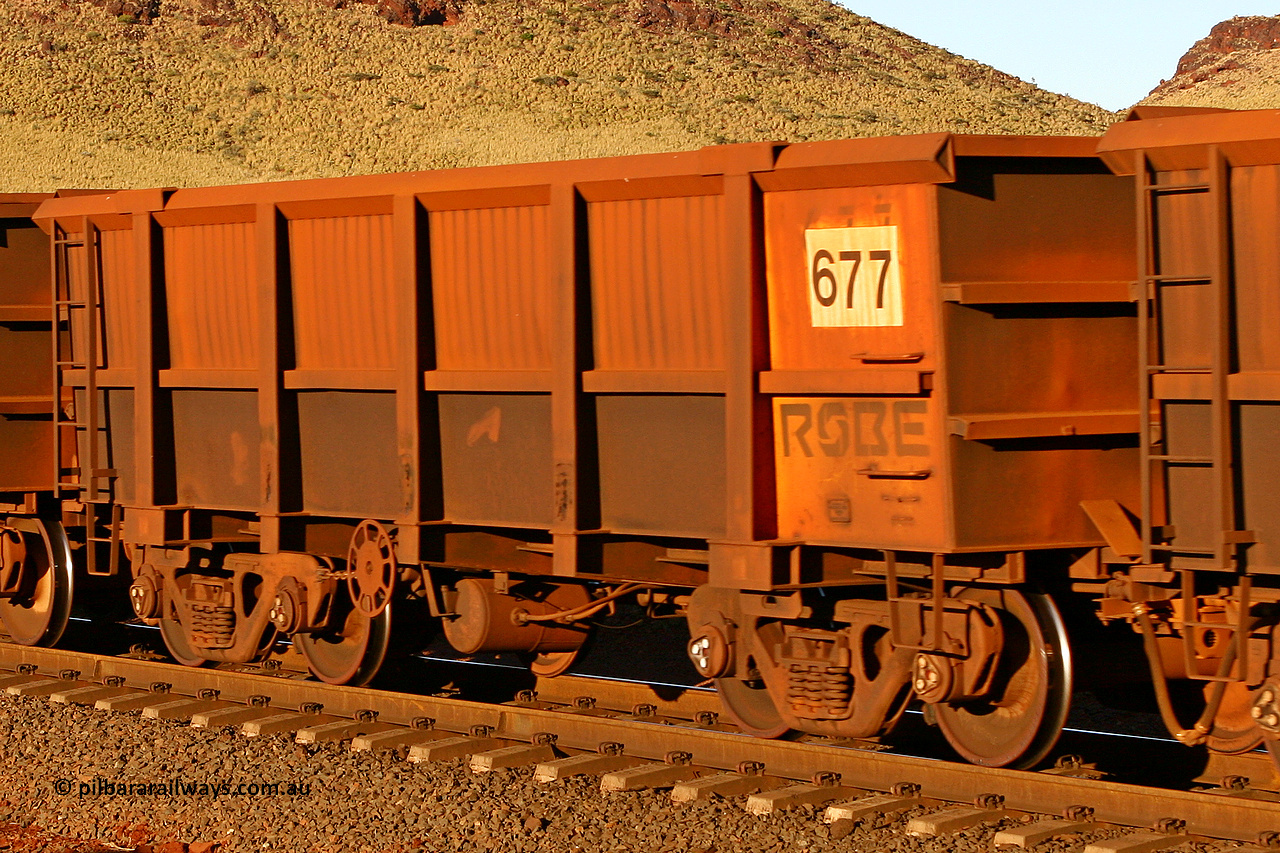 0677 060722 7589
Robe River ore waggon 677, built by Tomlinson Steel WA, rotary coupler end handbrake side empty view, at the 11.7 km, Cape Lambert. July 22, 2006.
Keywords: 677;Tomlinson-Steel-WA;Robe-ore-waggon;