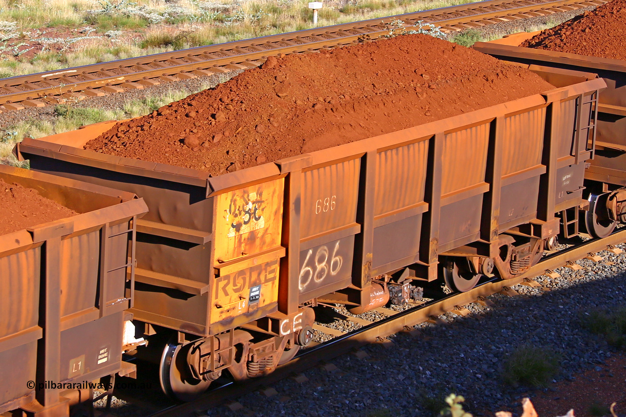 0686 210322 9768
Robe River ore waggon 686, built by Tomlinson Steel WA, rotary coupler end non-handbrake side loaded view at the 17 km on the Cape Lambert line, March 22, 2021.
Keywords: 686;Tomlinson-Steel-WA;Robe-ore-waggon;