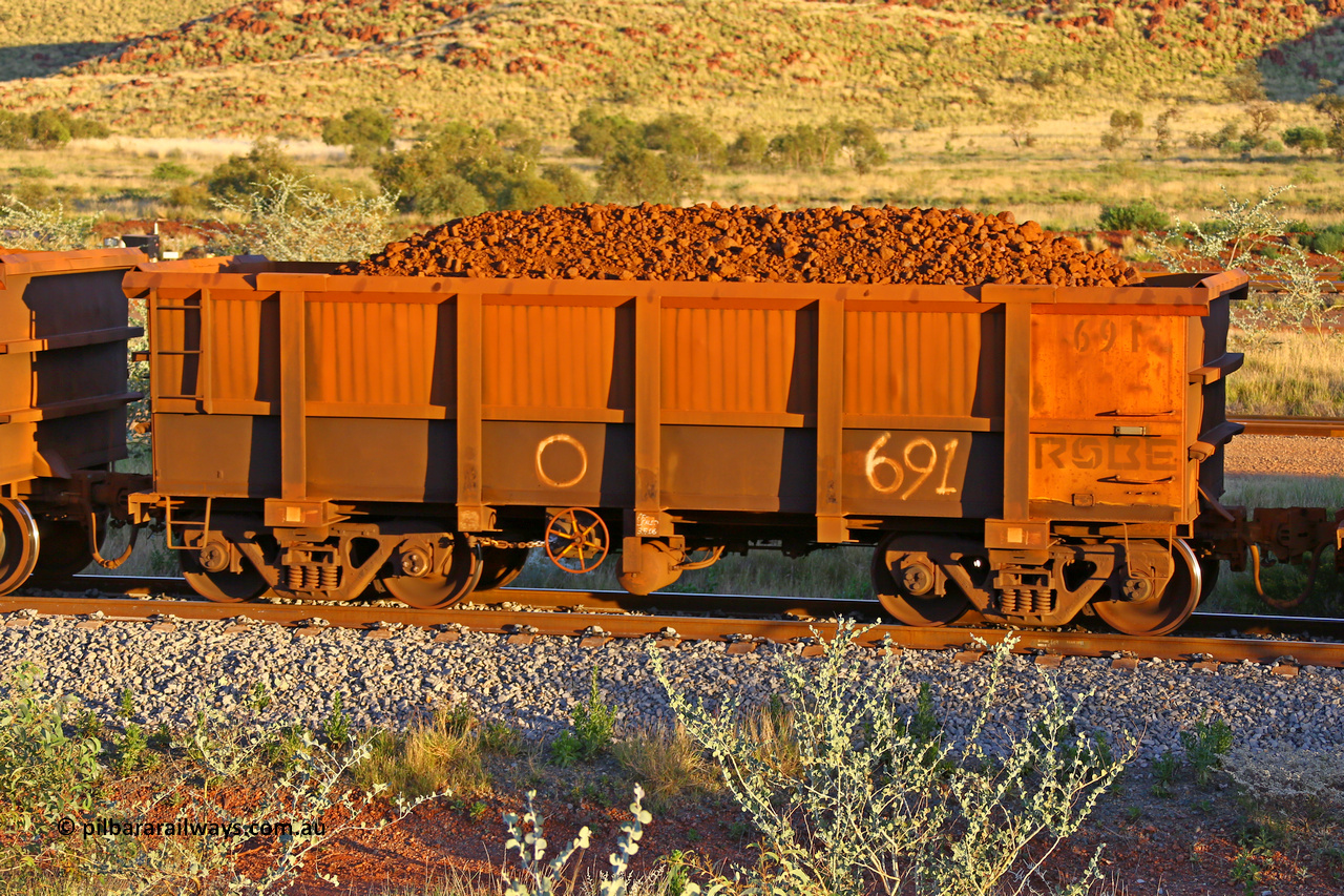 0691 170513 8690
Robe River ore waggon 691, built by Tomlinson Steel WA, rotary coupler end handbrake side loaded view, Cape Lambert yard, May 13, 2017.
Keywords: 691;Tomlinson-Steel-WA;Robe-ore-waggon;