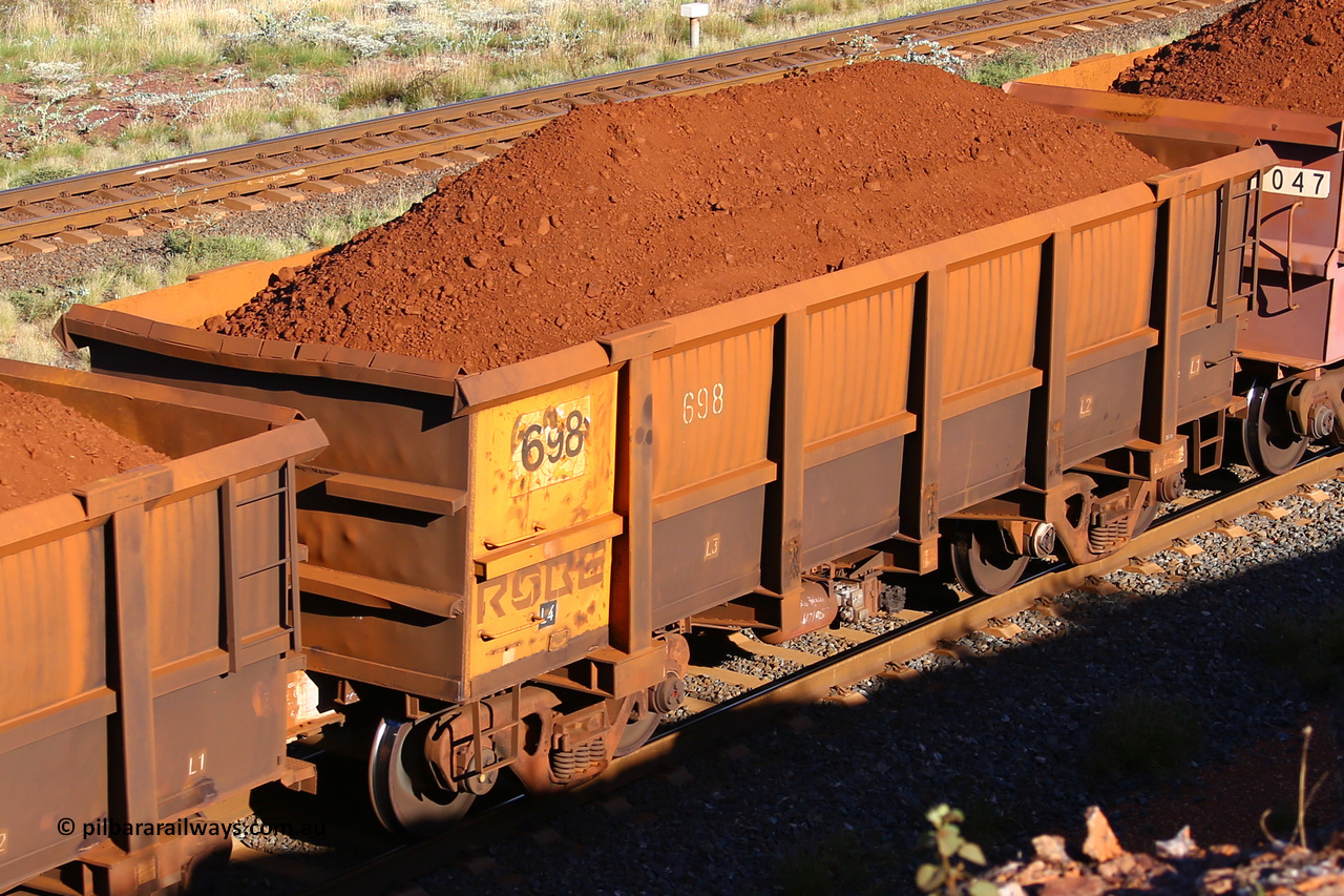 0698 210322 9681
Robe River ore waggon 698, built by Tomlinson Steel WA, rotary coupler end non-handbrake side loaded view at the 17 km on the Cape Lambert line, March 22, 2021.
Keywords: 698;Tomlinson-Steel-WA;Robe-ore-waggon;