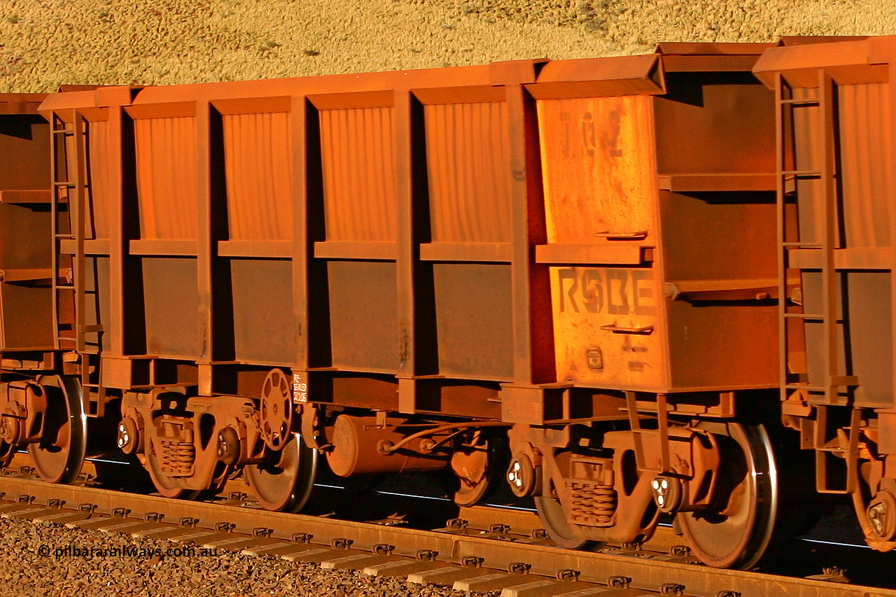 0702 060722 7593
Robe River ore waggon 702, built by Tomlinson Steel WA, rotary coupler end handbrake side empty view, at the 11.7 km, Cape Lambert. July 22, 2006.
Keywords: 702;Tomlinson-Steel-WA;Robe-ore-waggon;