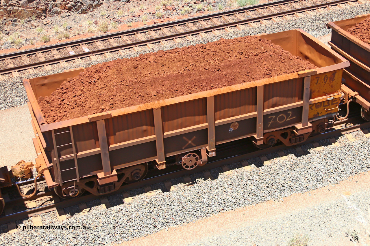 0702 160306 1459
Robe River ore waggon 702, built by Tomlinson Steel WA, fixed coupler handbrake side loaded view, at the 45 km, Harding Siding on the Cape Lambert line. March 6, 2016.
Keywords: 702;Tomlinson-Steel-WA;Robe-ore-waggon;
