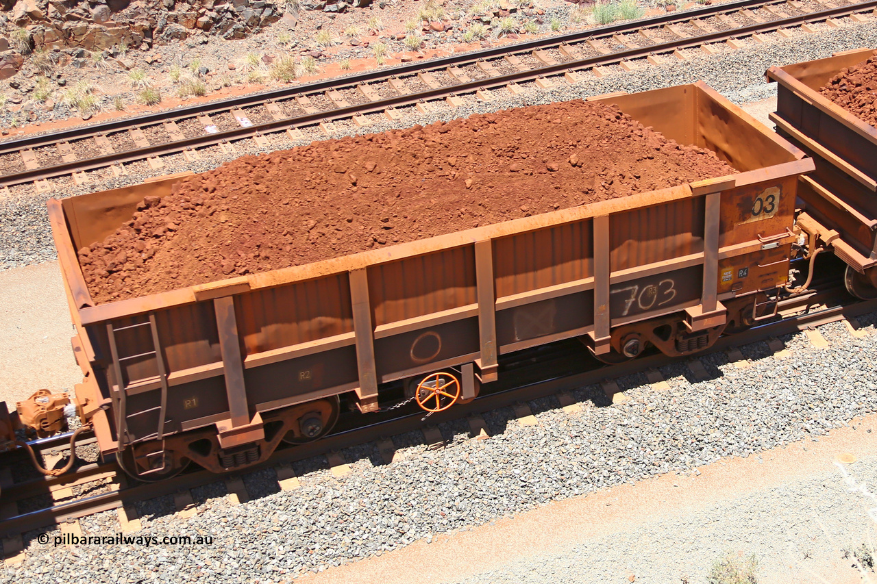 0703 160306 1458
Robe River ore waggon 703, built by Tomlinson Steel WA, fixed coupler handbrake side loaded view, at the 45 km, Harding Siding on the Cape Lambert line. March 6, 2016.
Keywords: 703;Tomlinson-Steel-WA;Robe-ore-waggon;