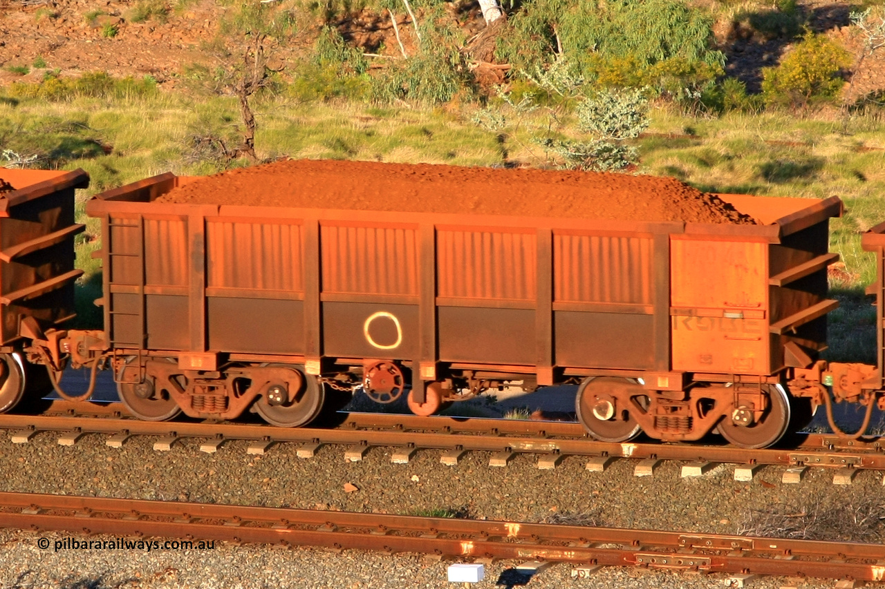 0704 110602 1636
Robe River ore waggon 704, built by Tomlinson Steel WA, rotary coupler end handbrake side loaded view at the 71 km, Western Creek on the Deepdale line. June 2, 2011.
Keywords: 704;Tomlinson-Steel-WA;Robe-ore-waggon;