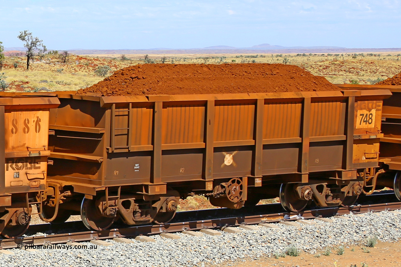 0748 170729 0219
Robe River ore waggon 748, built by Tomlinson Steel WA, fixed coupler handbrake side loaded view at the 103 km, between Maitland Siding and the Fortescue River on the Deepdale line. July 29, 2017.
Keywords: 748;Tomlinson-Steel-WA;Robe-ore-waggon;