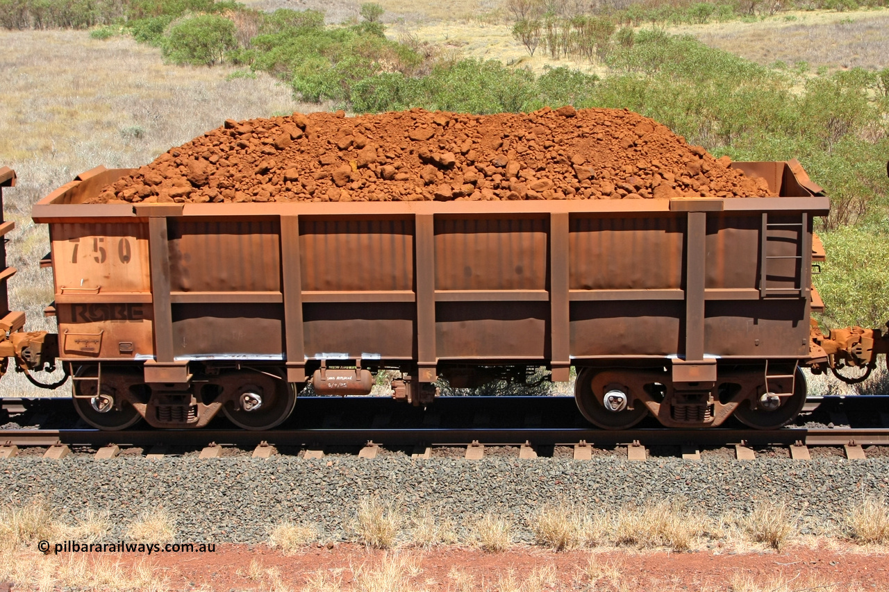 0750 081209 0145
Robe River ore waggon 750, built by Tomlinson Steel WA, non-handbrake side loaded view at the 7 km location just south of Cape Lambert yard. December 9, 2008.
Keywords: 750;Tomlinson-Steel-WA;Robe-ore-waggon;
