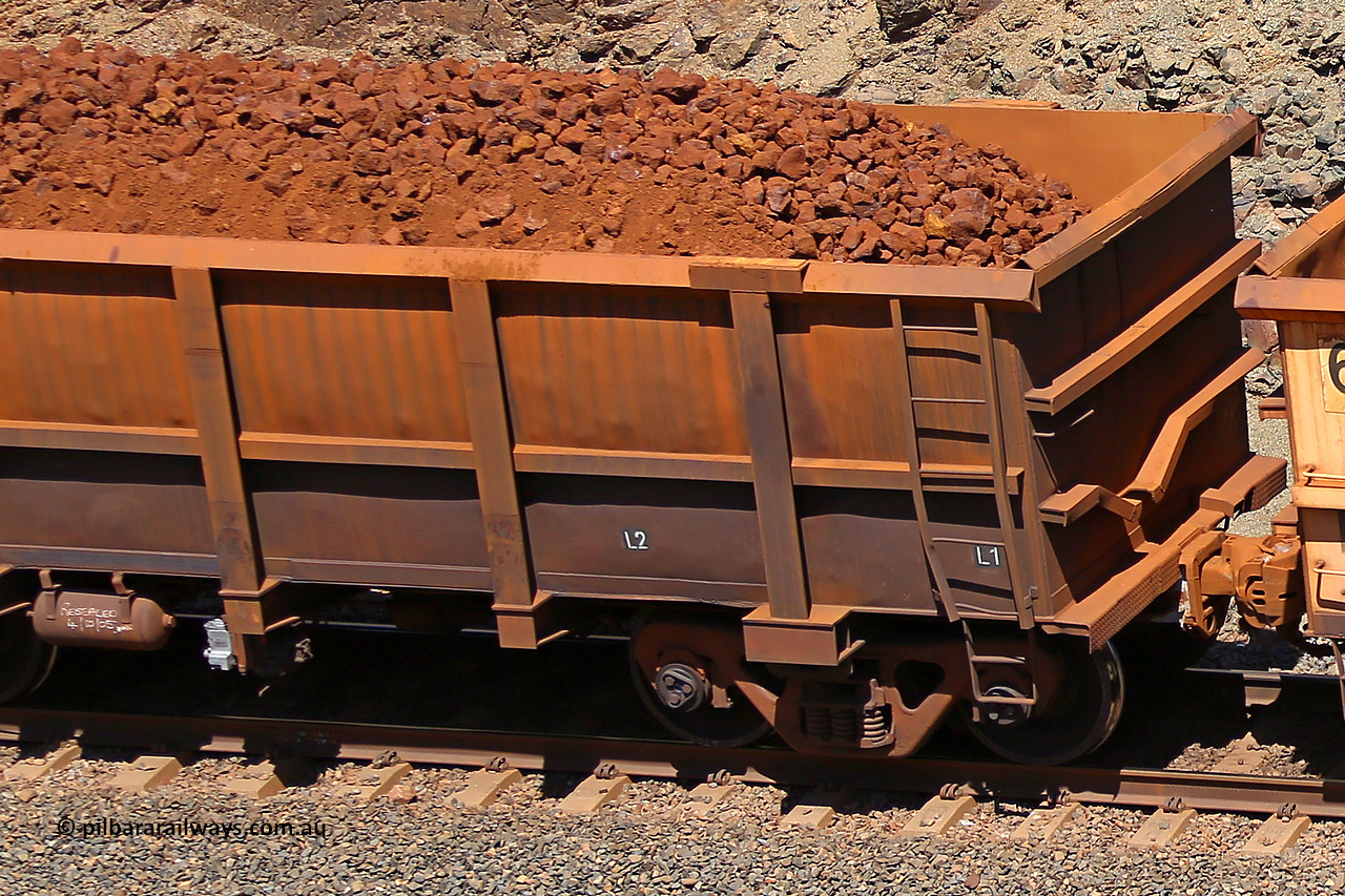 0754 160306 1657
Robe River ore waggon 754, built by Centurion Industries WA, fixed coupler non-handbrake side loaded partial view showing drop rib end, at the 45 km, Harding Siding on the Cape Lambert line. March 6, 2016.
Keywords: 754;Centurion-Industries-WA;Robe-ore-waggon;