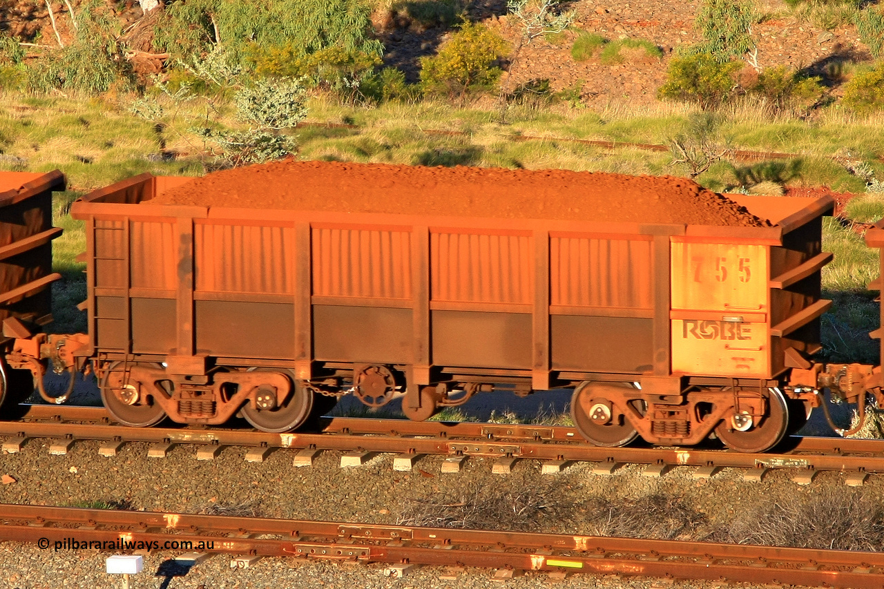 0755 110602 1664
Robe River ore waggon 755, built by Centurion Industries WA, rotary coupler end handbrake side loaded view at the 71 km, Western Creek on the Deepdale line. June 2, 2011.
Keywords: 755;Centurion-Industries-WA;Robe-ore-waggon;