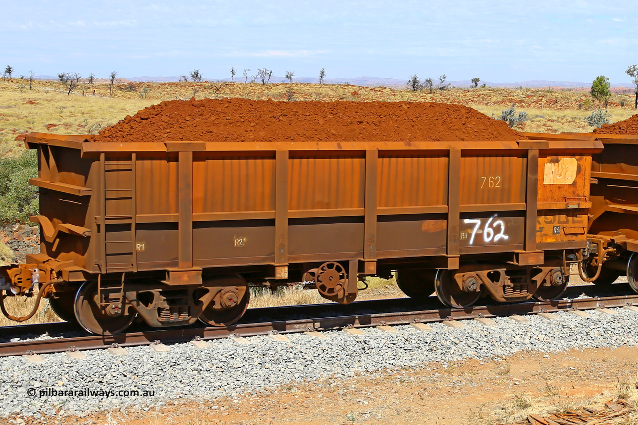 0762 170729 0243
Robe River ore waggon 762, built by Centurion Industries WA, fixed coupler handbrake side loaded view at the 103 km, between Maitland Siding and the Fortescue River on the Deepdale line. July 29, 2017.
Keywords: 762;Centurion-Industries-WA;Robe-ore-waggon;