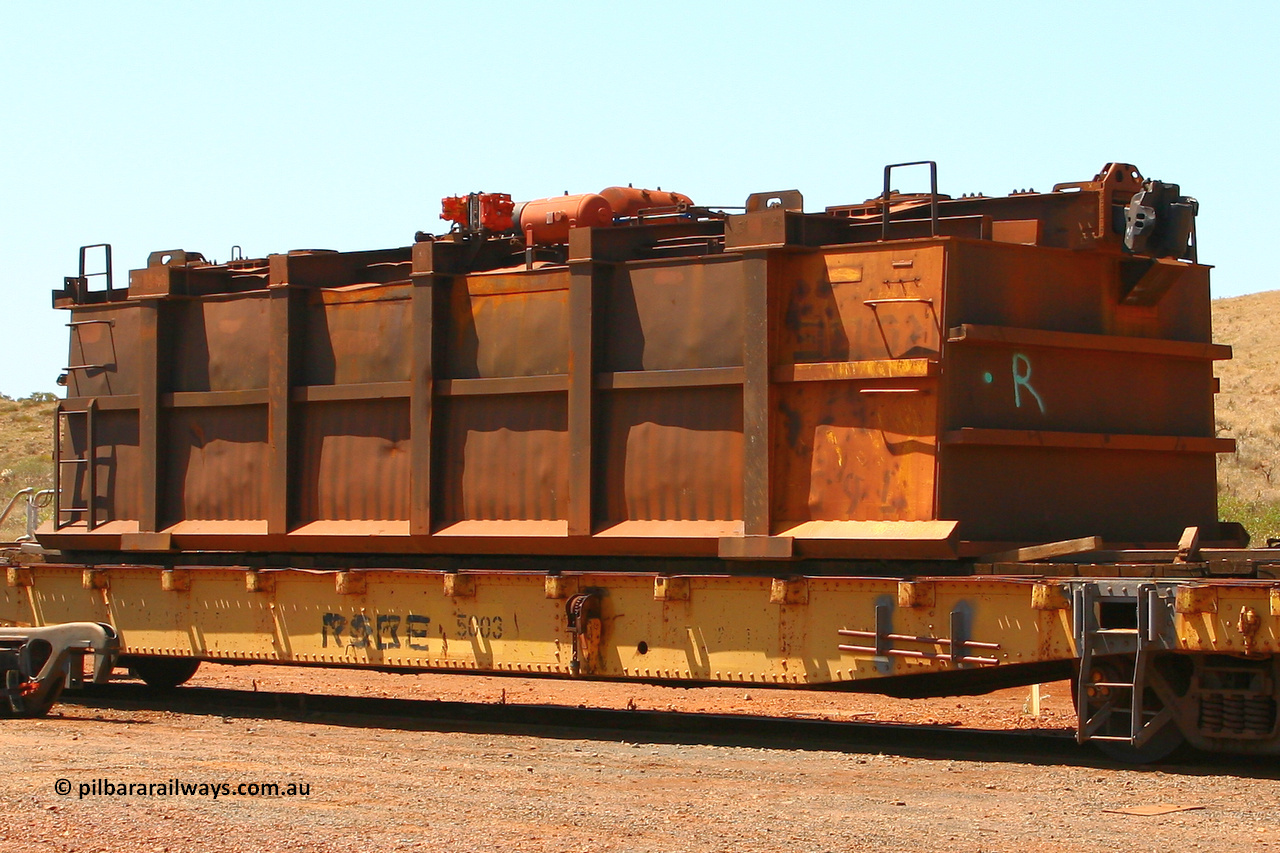0765 070909 0666
Robe River ore waggon 765, built by Centurion Industries WA, rotary coupler end non-handbrake side upside down on flat waggon 5003, Cape Lambert. September 9, 2007.
Keywords: 765;Centurion-Industries-WA;Robe-ore-waggon;5003;Robe-flat-waggon;