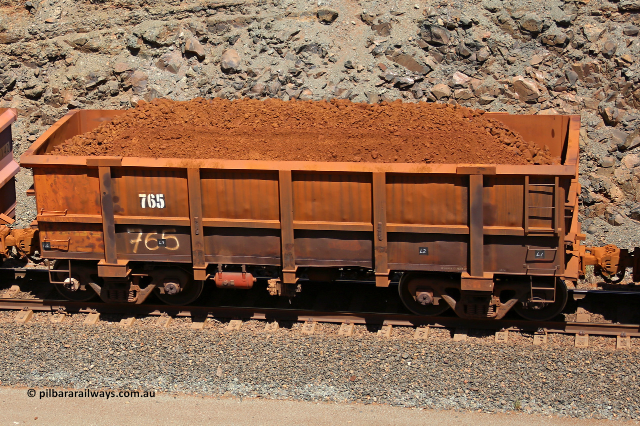 0765 160306 1605
Robe River ore waggon 765, built by Centurion Industries WA, fixed coupler non-handbrake side loaded view, at the 45 km, Harding Siding on the Cape Lambert line. March 6, 2016.
Keywords: 765;Centurion-Industries-WA;Robe-ore-waggon;