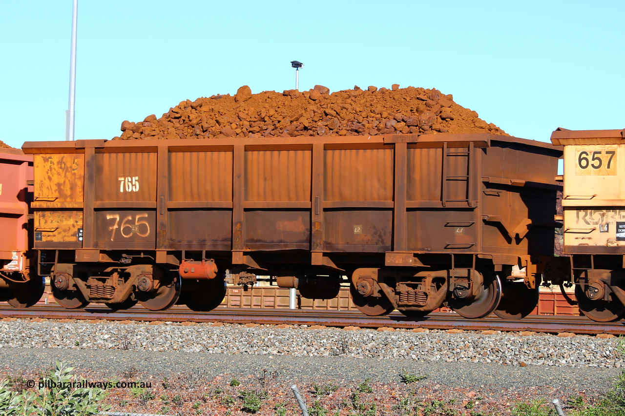 0765 210322 9386
Robe River ore waggon 765, built by Centurion Industries  WA, fixed coupler non-handbrake side loaded view at Cape Lambert yard, March 22, 2021.
Keywords: 765;Centurion-Industries-WA;Robe-ore-waggon;