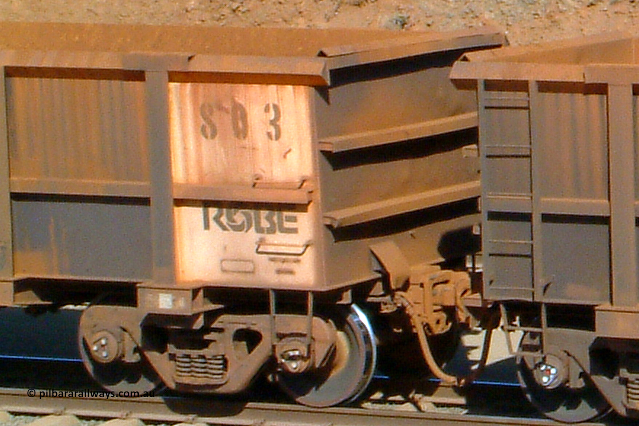 0803 041014 154200
Robe River ore waggon 803, built by Centurion Industries WA, rotary coupler end handbrake side view empty, Cape Lambert yard. 1542 hours, October 14, 2004.
Keywords: 803;Centurion-Industries-WA;Robe-ore-waggon;