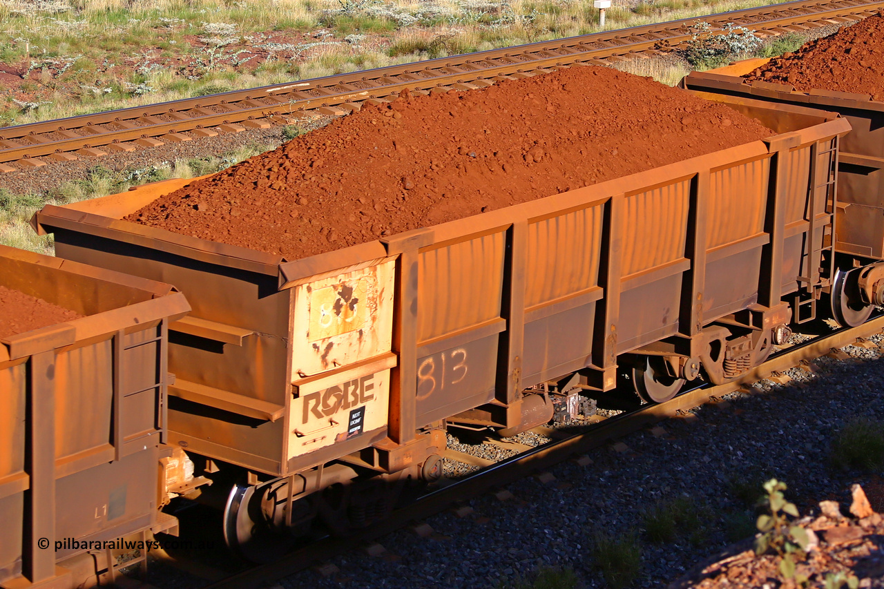 0813 210322 9758
Robe River ore waggon 813, built by Centurion Industries  WA, rotary coupler end non-handbrake side loaded view at the 17 km on the Cape Lambert line, March 22, 2021.
Keywords: 813;Centurion-Industries-WA;Robe-ore-waggon;