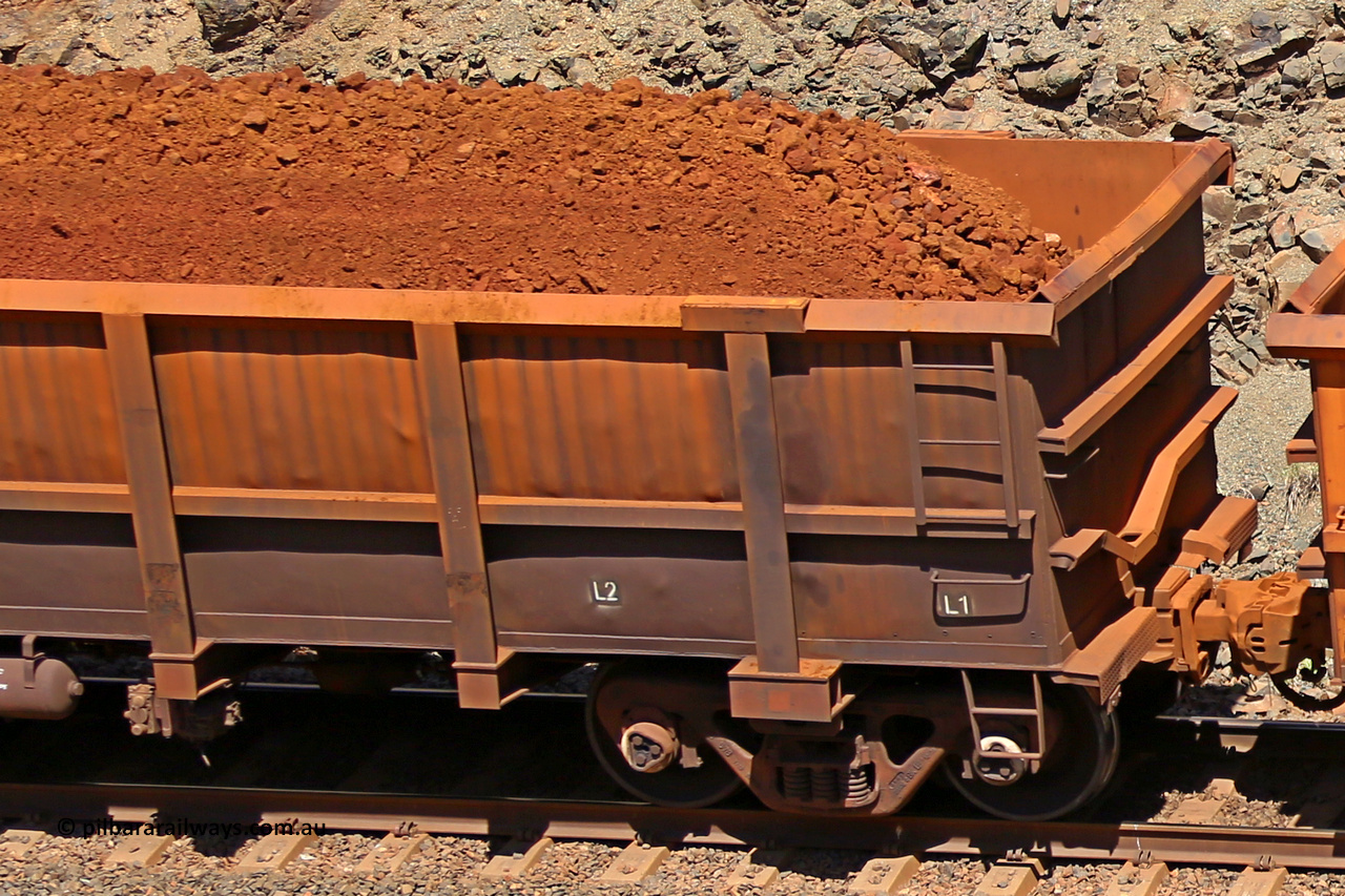 0816 160306 1585
Robe River ore waggon 816, built by Centurion Industries WA, fixed coupler non-handbrake side loaded view showing drop rib end detail, at the 45 km, Harding Siding on the Cape Lambert line. March 6, 2016.
Keywords: 816;Centurion-Industries-WA;Robe-ore-waggon;