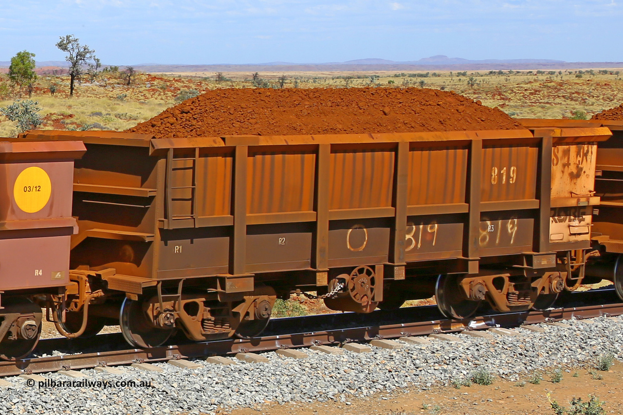 0819 170729 0213
Robe River ore waggon 819, built by Centurion Industries WA, fixed coupler handbrake side loaded view at the 103 km, between Maitland Siding and the Fortescue River on the Deepdale line. July 29, 2017.
Keywords: 819;Centurion-Industries-WA;Robe-ore-waggon;