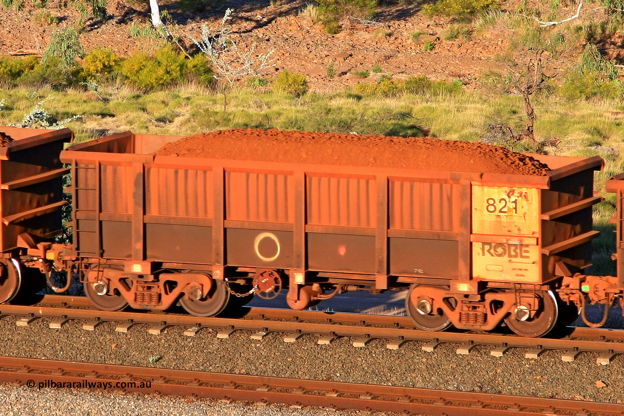 0821 110602 1719
Robe River ore waggon 821, built by Centurion Industries WA, rotary coupler end handbrake side loaded view at the 71 km, Western Creek on the Deepdale line. June 2, 2011.
Keywords: 821;Centurion-Industries-WA;Robe-ore-waggon;