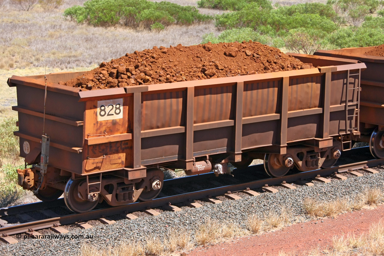 0828 081209 0173
Robe River ore waggon 828, built by Centurion Industries WA, rotary coupler end non-handbrake side loaded end of train view at the 7 km location just south of Cape Lambert yard. December 9, 2008.
Keywords: 828;Centurion-Industries-WA;Robe-ore-waggon;