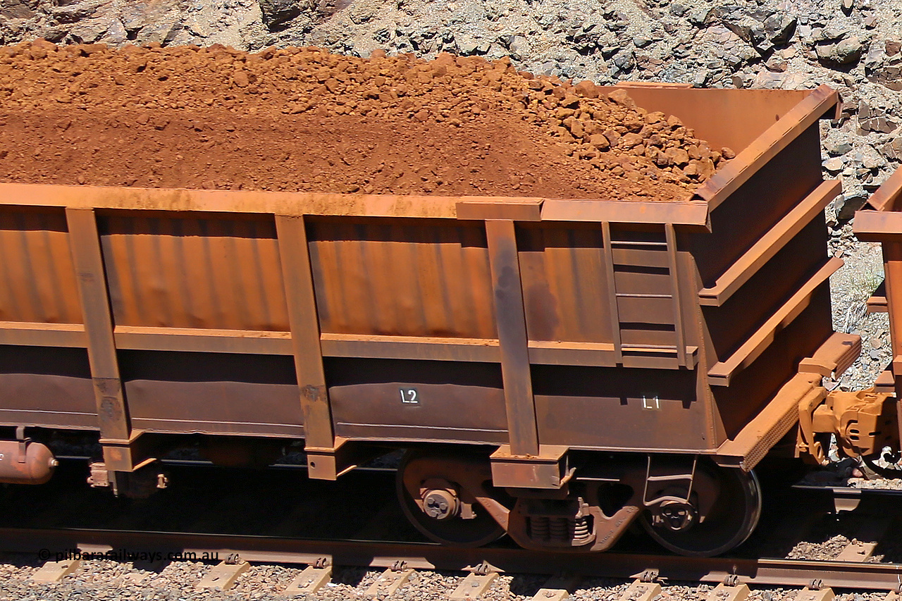 0829 160306 1597
Robe River ore waggon 829, built by Centurion Industries WA, fixed coupler non-handbrake side loaded view showing end detail, at the 45 km, Harding Siding on the Cape Lambert line. March 6, 2016.
Keywords: 829;Centurion-Industries-WA;Robe-ore-waggon;