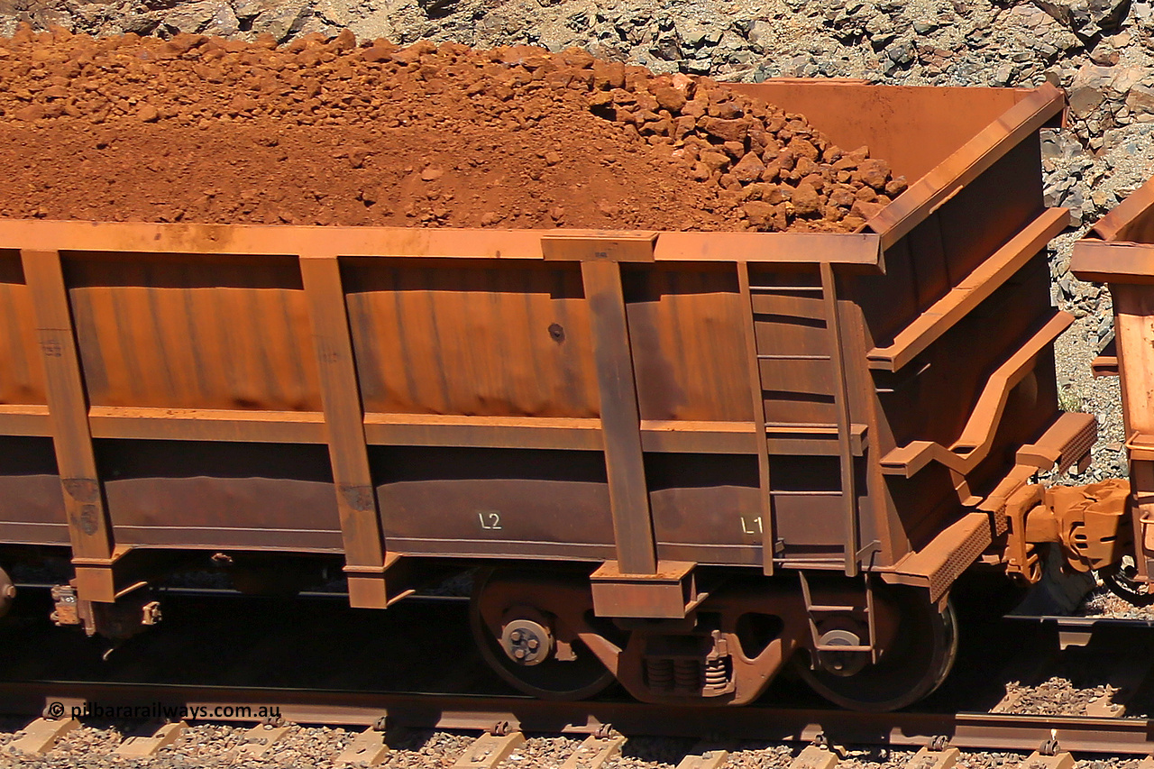 0832 160306 1603
Robe River ore waggon 832, built by Centurion Industries WA, fixed coupler non-handbrake side loaded view showing drop rib detail, at the 45 km, Harding Siding on the Cape Lambert line. March 6, 2016.
Keywords: 832;Centurion-Industries-WA;Robe-ore-waggon;