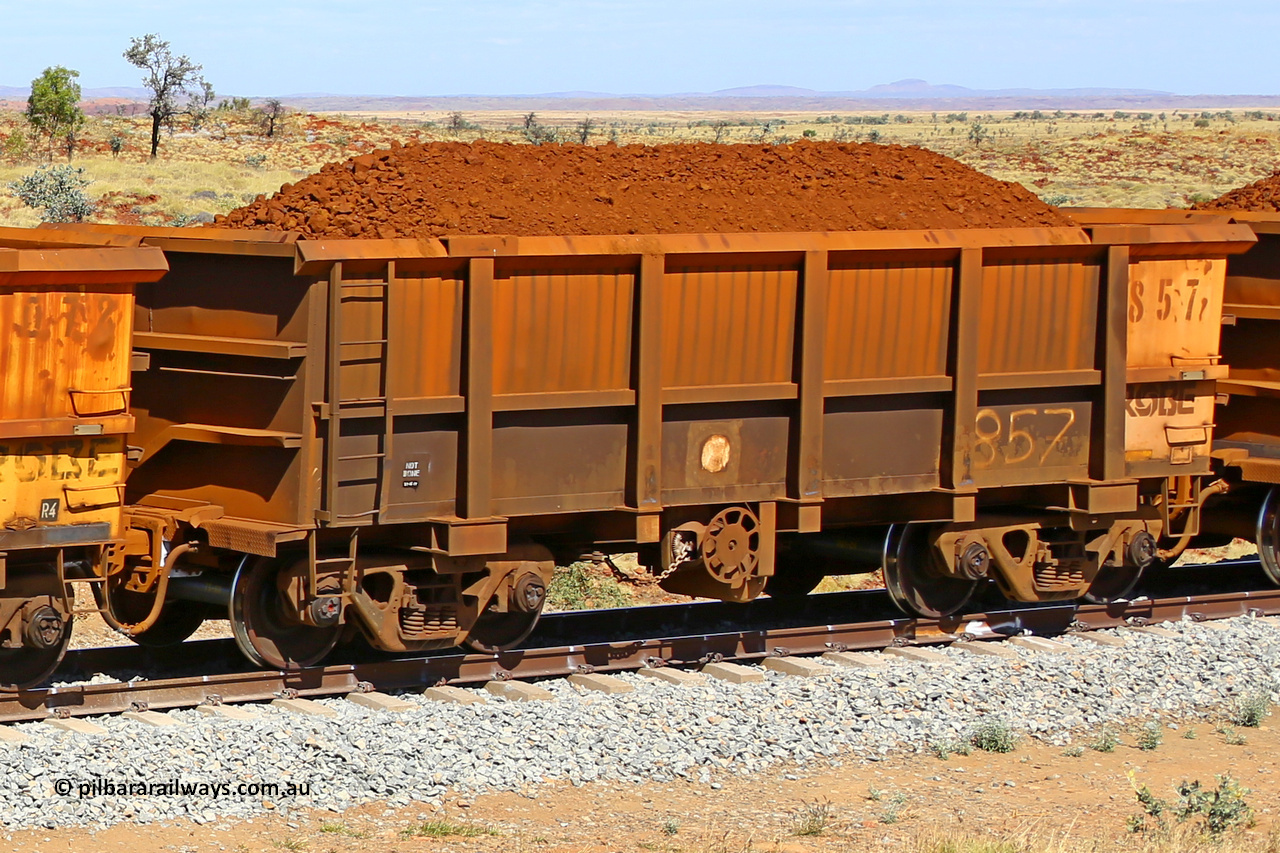 0857 170729 0232
Robe River ore waggon 857, built by Centurion Industries WA, fixed coupler handbrake side loaded view at the 103 km, between Maitland Siding and the Fortescue River on the Deepdale line. July 29, 2017.
Keywords: 857;Centurion-Industries-WA;Robe-ore-waggon;
