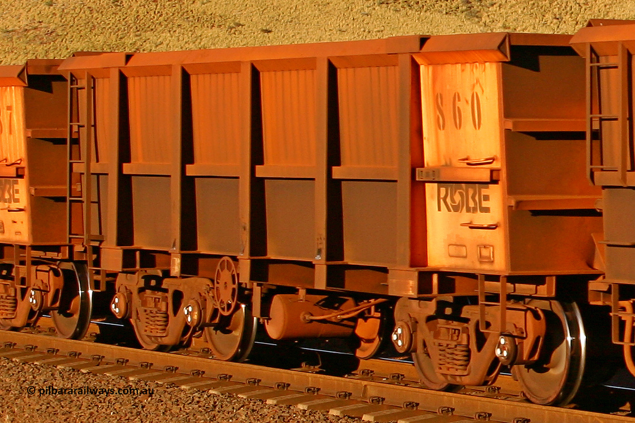 0860 060722 7636
Robe River ore waggon 860, built by Centurion Industries WA, rotary coupler end handbrake side empty view, at the 11.7 km, Cape Lambert. July 22, 2006.
Keywords: 860;Centurion-Industries-WA;Robe-ore-waggon;