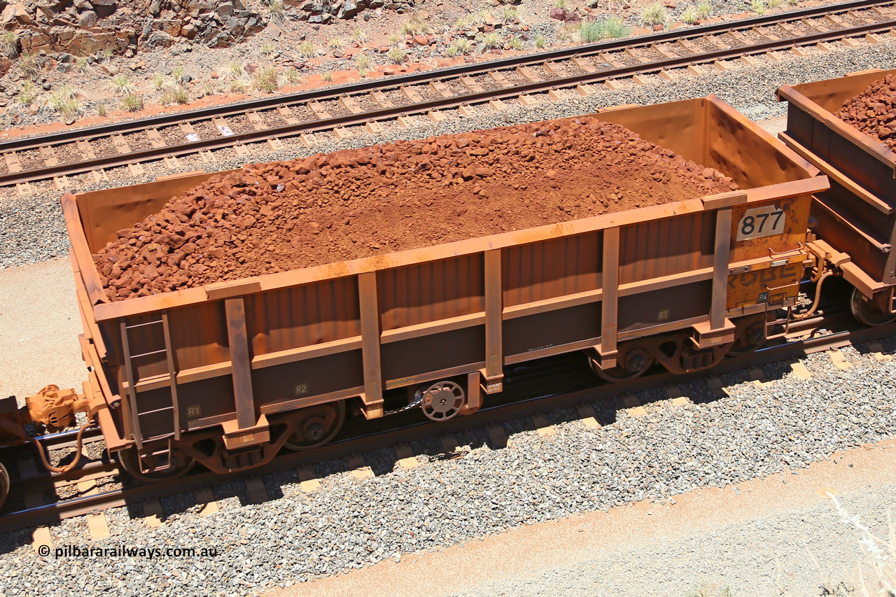 0877 160306 1493
Robe River ore waggon 877, built by Centurion Industries WA, fixed coupler handbrake side loaded view, at the 45 km, Harding Siding on the Cape Lambert line. March 6, 2016.
Keywords: 877;Centurion-Industries-WA;Robe-ore-waggon;