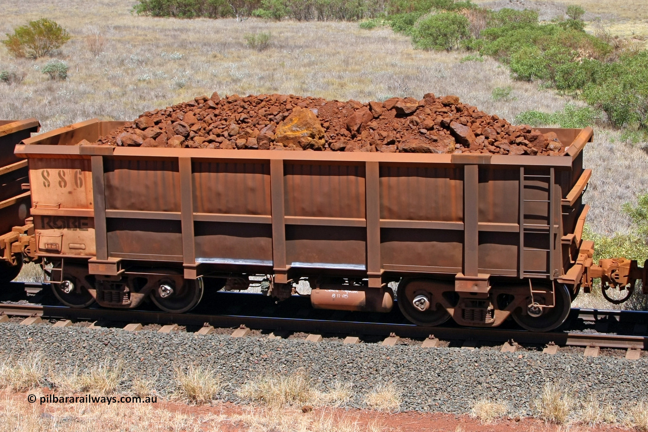 0886 081209 0151
Robe River ore waggon 886, built by Centurion Industries WA, non-handbrake side loaded view at the 7 km location just south of Cape Lambert yard. December 9, 2008.
Keywords: 886;Centurion-Industries-WA;Robe-ore-waggon;