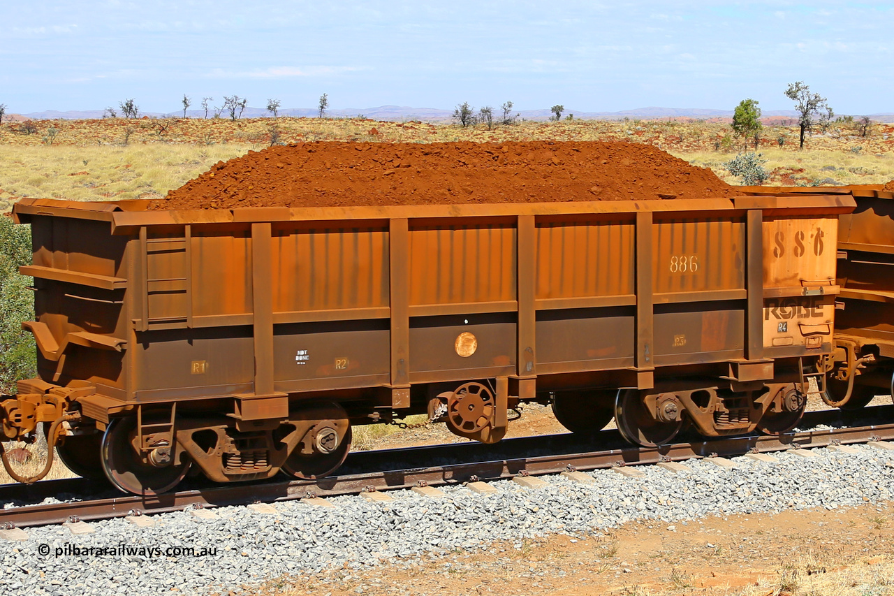 0886 170729 0219
Robe River ore waggon 886, built by Centurion Industries WA, fixed coupler handbrake side loaded view at the 103 km, between Maitland Siding and the Fortescue River on the Deepdale line. July 29, 2017.
Keywords: 886;Centurion-Industries-WA;Robe-ore-waggon;
