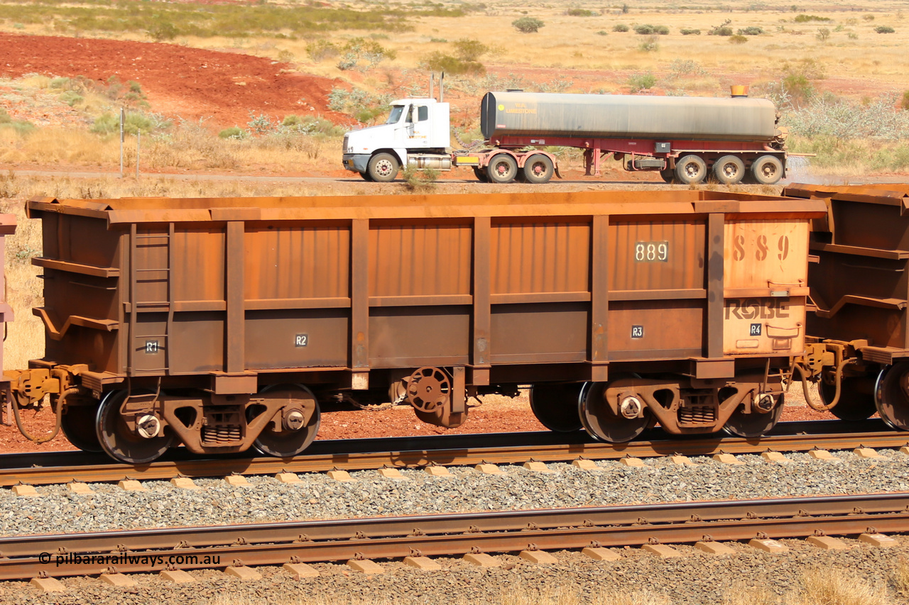 0889 141124 6819
Robe River ore waggon 889, built by Centurion Industries WA, fixed coupler handbrake side empty view at the 25 km at Arches Siding on the Cape Lambert line. November 24, 2014.
Keywords: 889;Centurion-Industries-WA;Robe-ore-waggon;