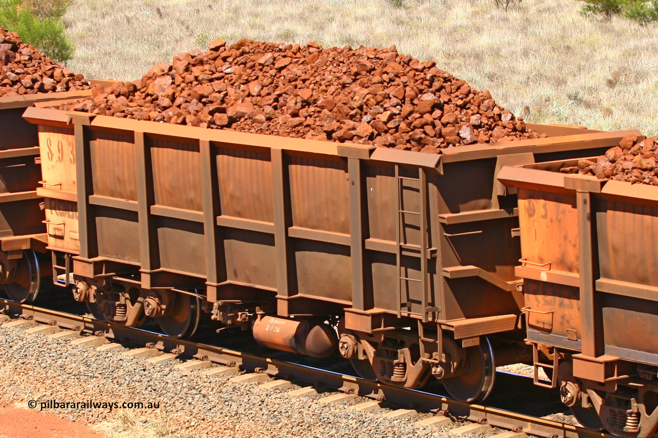 0893 061209 8176
Robe River ore waggon 893, built by Centurion Industries WA, fixed coupler non-handbrake side loaded view at the 7 km location just south of Cape Lambert yard. December 9, 2006.
Keywords: 893;Centurion-Industries-WA;Robe-ore-waggon;