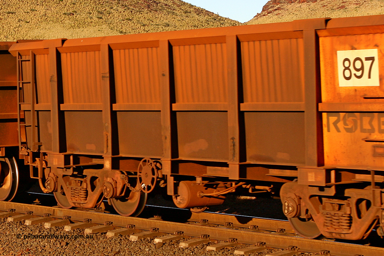 0897 060722 7588
Robe River ore waggon 897, built by Centurion Industries WA, rotary coupler end handbrake side empty partial view, at the 11.7 km, Cape Lambert. July 22, 2006.
Keywords: 897;Centurion-Industries-WA;Robe-ore-waggon;