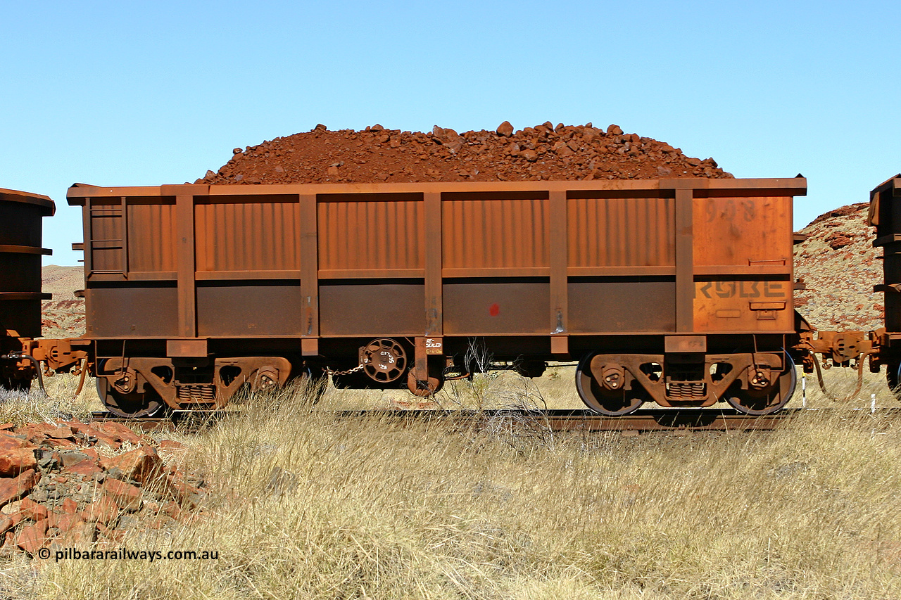 0908 060722 7493
Robe River ore waggon 908, built by Centurion Industries WA, handbrake side loaded view at the 78.8 km between Western Creek and Maitland on the Deepdale line. July 22, 2006.
Keywords: 908;Centurion-Industries-WA;Robe-ore-waggon;