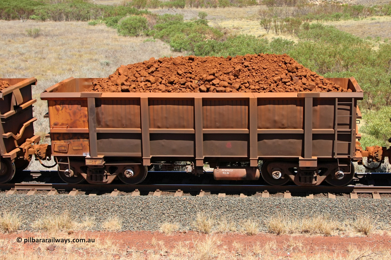 0908 081209 0140
Robe River ore waggon 908, built by Centurion Industries WA, non-handbrake side loaded view at the 7 km location just south of Cape Lambert yard. December 9, 2008.
Keywords: 908;Centurion-Industries-WA;Robe-ore-waggon;